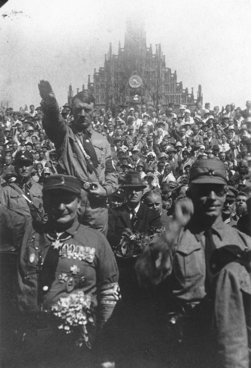 Adolf Hitler salutes the parade of the SA at the 1929 Reichsparteitag